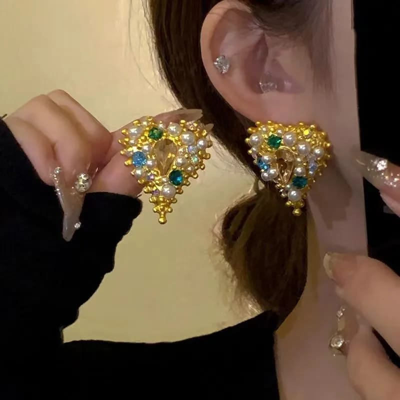 Aretes estilo glamour con perlas