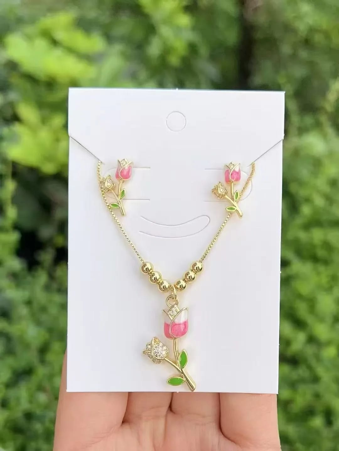Set de joyeria con estilo floral rosado