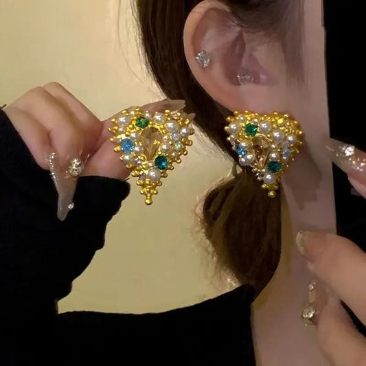 Aretes estilo glamour con perlas