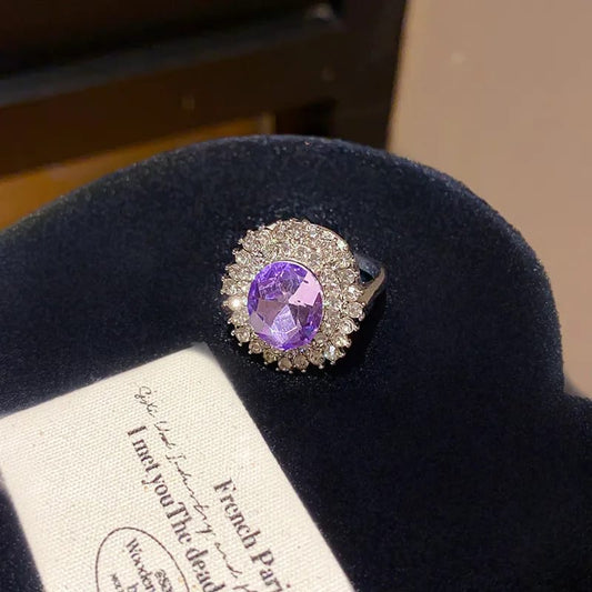 Anillo glamouroso con cristal morado