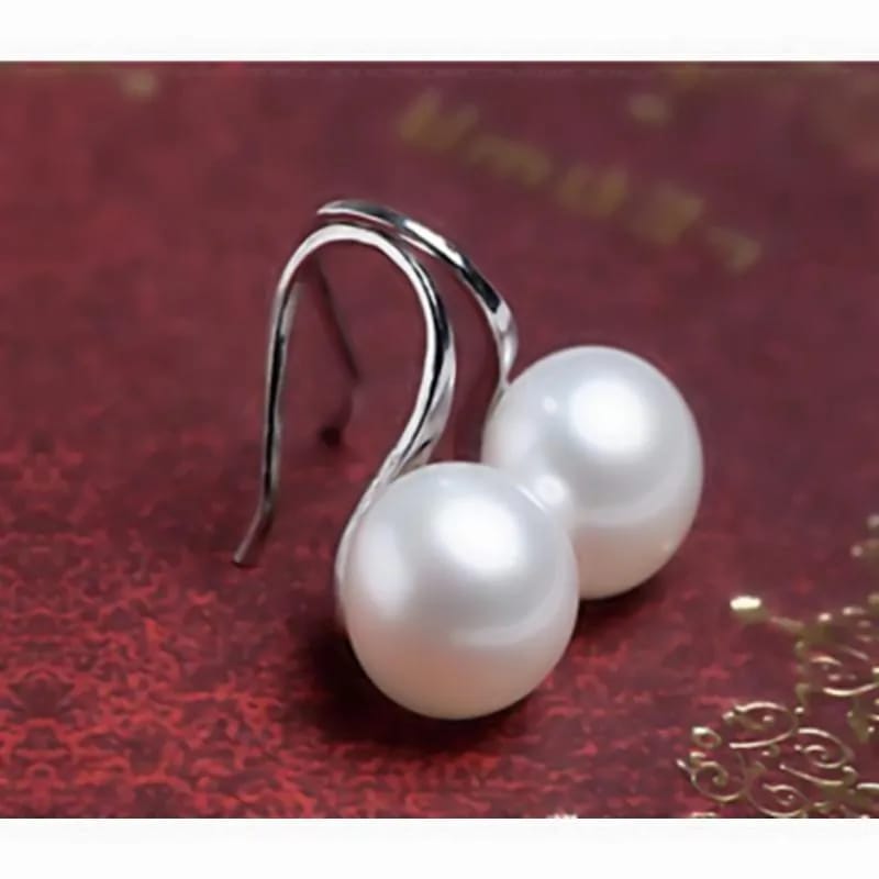Aretes elegance con perla esferica